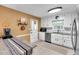 Well-lit kitchen with stainless steel appliances and granite countertops at 6863 Recreation Ln, Acworth, GA 30102