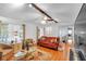 Inviting living room featuring a cozy seating area and hardwood floors at 6863 Recreation Ln, Acworth, GA 30102