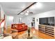 Comfortable living room with a beamed ceiling and natural light at 6863 Recreation Ln, Acworth, GA 30102