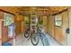 Inside of shed with storage including bicycles and fans at 6863 Recreation Ln, Acworth, GA 30102