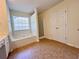 Large bathroom featuring soaking tub, glass shower, and linen closet at 2130 Chattahoochee Dr, Duluth, GA 30097