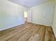 This bedroom features wood-look flooring and neutral walls at 2130 Chattahoochee Dr, Duluth, GA 30097