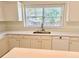 Bright kitchen with quartz countertops, stainless steel appliances and ample cabinet space at 2130 Chattahoochee Dr, Duluth, GA 30097