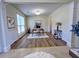 Bright office with wood floors, white trim and lots of natural light from the large windows at 2130 Chattahoochee Dr, Duluth, GA 30097