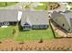 Home with a well-manicured lawn, patio, and view of the surrounding neighborhood at 302 Bunker Hill Ct, Acworth, GA 30102