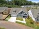Aerial view of home highlighting the roofline, landscaping and neighborhood at 302 Bunker Hill Ct, Acworth, GA 30102