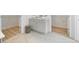 Bathroom with double-door access to two walk-in closets and single vanity at 302 Bunker Hill Ct, Acworth, GA 30102
