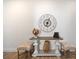Hallway decorated with a console table, stools, a globe, a clock, and decorative accents at 302 Bunker Hill Ct, Acworth, GA 30102