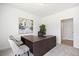 Bright office space with a large desk, neutral carpet, and white walls at 302 Bunker Hill Ct, Acworth, GA 30102