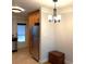 Cozy dining area adjacent to the kitchen with modern lighting and stainless steel appliances at 375 6Th Ne St # 5, Atlanta, GA 30308