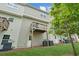 Spacious backyard featuring well-maintained lawn, home exterior, and partial tree coverage for comfortable outdoor living at 4173 Chatham Ridge Dr, Buford, GA 30518
