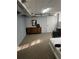 View of an unfinished basement with exposed ductwork and carpet at 6540 Old White Mill Road Rd, Fairburn, GA 30213