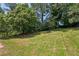 Large grassy backyard offers great potential for gardening and recreation at 2105 Royal Fox Way, Decatur, GA 30032