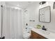This stylish bathroom features a shower-tub combination and modern fixtures at 2105 Royal Fox Way, Decatur, GA 30032