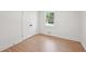 Bedroom featuring hardwood floors, and window at 2105 Royal Fox Way, Decatur, GA 30032