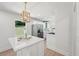 Modern kitchen with a quartz countertop island, stainless steel appliances, recessed lighting, and shaker style cabinets at 2105 Royal Fox Way, Decatur, GA 30032