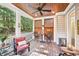 Comfortable back porch with wood floors, ceiling and wooded views at 238 Trecastle Sq, Canton, GA 30114