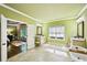Bathroom showcasing a double vanity, soaking tub, and access to the bedroom at 238 Trecastle Sq, Canton, GA 30114