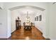 Formal dining room with hardwood floors and classic architectural details at 238 Trecastle Sq, Canton, GA 30114