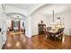 Elegant dining room featuring hardwood floors and an arched entry at 238 Trecastle Sq, Canton, GA 30114