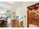 Hallway with beautiful wood floors, desk and an elevator at 238 Trecastle Sq, Canton, GA 30114
