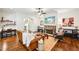 Inviting living room featuring hardwood floors, fireplace, and a dedicated desk space at 238 Trecastle Sq, Canton, GA 30114