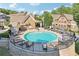 A beautiful community pool with ample seating and well-maintained landscaping at 238 Trecastle Sq, Canton, GA 30114