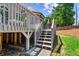 Backyard deck stairs leading to the lawn at 4251 Lantern Hill Dr, Dacula, GA 30019
