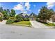 Charming single Gathering home featuring a 2-car garage, landscaped yard, and beautiful lawn at 4251 Lantern Hill Dr, Dacula, GA 30019