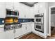 Modern kitchen featuring stainless steel appliances, white cabinets, and a gas range at 4251 Lantern Hill Dr, Dacula, GA 30019
