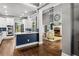 Open-concept kitchen flowing into the living room with a fireplace at 4251 Lantern Hill Dr, Dacula, GA 30019
