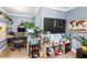 Home office area with built-in desk, comfortable chair, and ample natural light at 4251 Lantern Hill Dr, Dacula, GA 30019