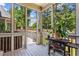 Cozy screened porch with grill and view of the backyard at 4251 Lantern Hill Dr, Dacula, GA 30019
