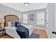 Serene bedroom featuring a comfortable bed, natural light, and neutral décor at 786 Neal Nw St, Atlanta, GA 30318