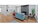 Open-concept living room seamlessly connects to a modern kitchen, ideal for entertaining at 786 Neal Nw St, Atlanta, GA 30318