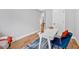 Bright office space with desk, hardwood floors, and cozy chair with red pillow at 786 Neal Nw St, Atlanta, GA 30318