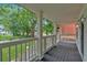 Inviting porch with white columns and railings offering a relaxing outdoor space at 786 Neal Nw St, Atlanta, GA 30318