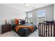 Light-filled bedroom with modern decor, two windows, and a comfortable crib for children at 9307 Glenleigh Way, Jonesboro, GA 30236