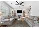Cozy living room with built-in bookshelves and a marble fireplace at 9307 Glenleigh Way, Jonesboro, GA 30236
