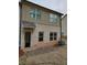 Two-story home with brick back and brick paver patio at 181 Dewy Rd # 70, Lilburn, GA 30047