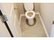 Small toilet room with tile floors at 181 Dewy Rd # 70, Lilburn, GA 30047