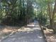 Wooded walking trail with bridge at 181 Dewy Rd # 70, Lilburn, GA 30047