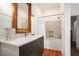 Stylish bathroom featuring a vanity with white countertop and a shower-tub combination at 2 N Broad St, Porterdale, GA 30070