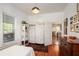 Comfortable bedroom with hardwood floors and ample natural light at 2 N Broad St, Porterdale, GA 30070