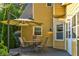 Back deck offers seating, table, umbrella, and view of home exterior at 2366 Battle Forest Sw Dr, Marietta, GA 30064