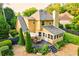 Backyard featuring a deck, enclosed porch, and gravel patio area with a fence at 2366 Battle Forest Sw Dr, Marietta, GA 30064