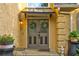 Charming front entrance featuring double doors with decorative wreaths and a covered entryway at 2366 Battle Forest Sw Dr, Marietta, GA 30064