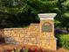 Stone monument sign for Battle Forest subdivision with manicured landscaping at 2366 Battle Forest Sw Dr, Marietta, GA 30064