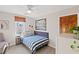 Relaxing bedroom with blue accents, natural light and a picture window at 1495 Oak Springs Dr, Marietta, GA 30066