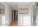 Welcoming foyer featuring hardwood floors, neutral paint, and staircase at 1495 Oak Springs Dr, Marietta, GA 30066